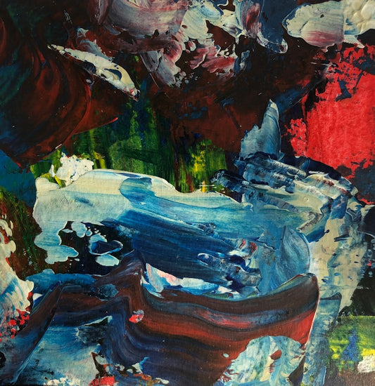 an abstract painting of blue and red colors