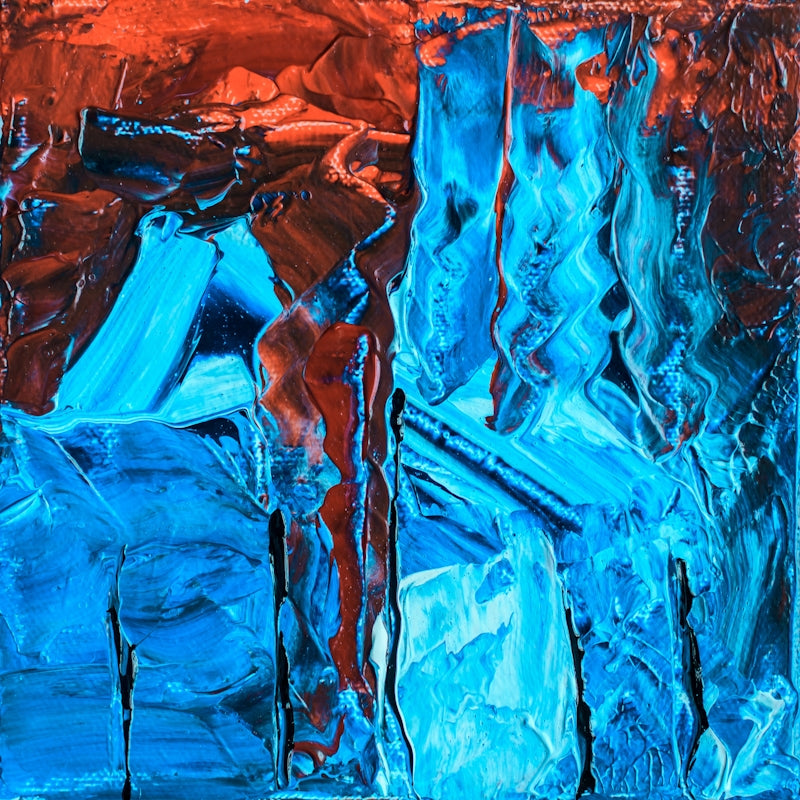 a painting of blue and red ice on a red background